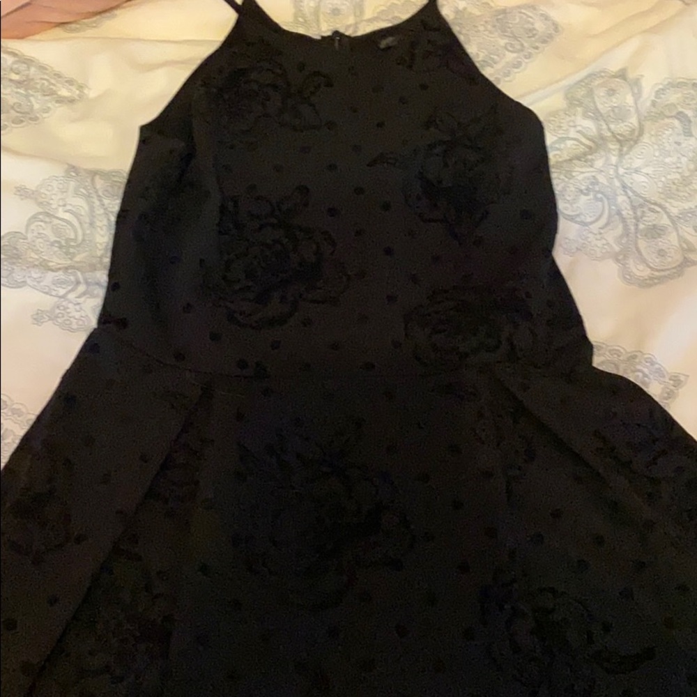 Black dress with floral designs spigetti straps
